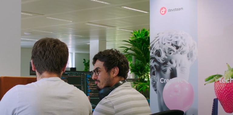 Aziz Segaoui: Two men working together at the Devoteam office