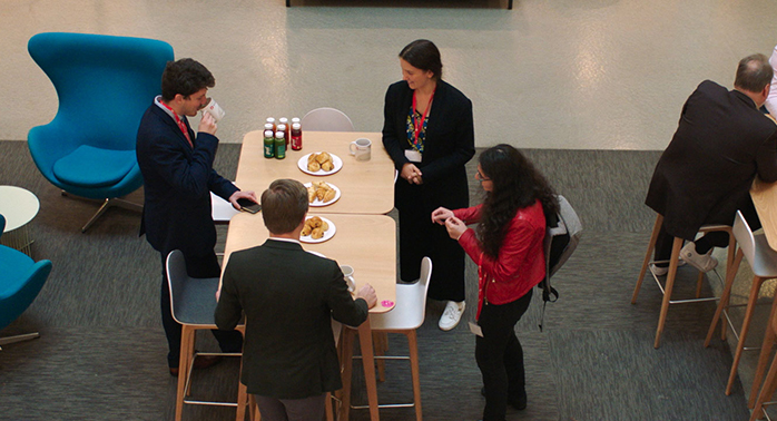 Devoteam Multi Cloud team: a group of people eating lunch together